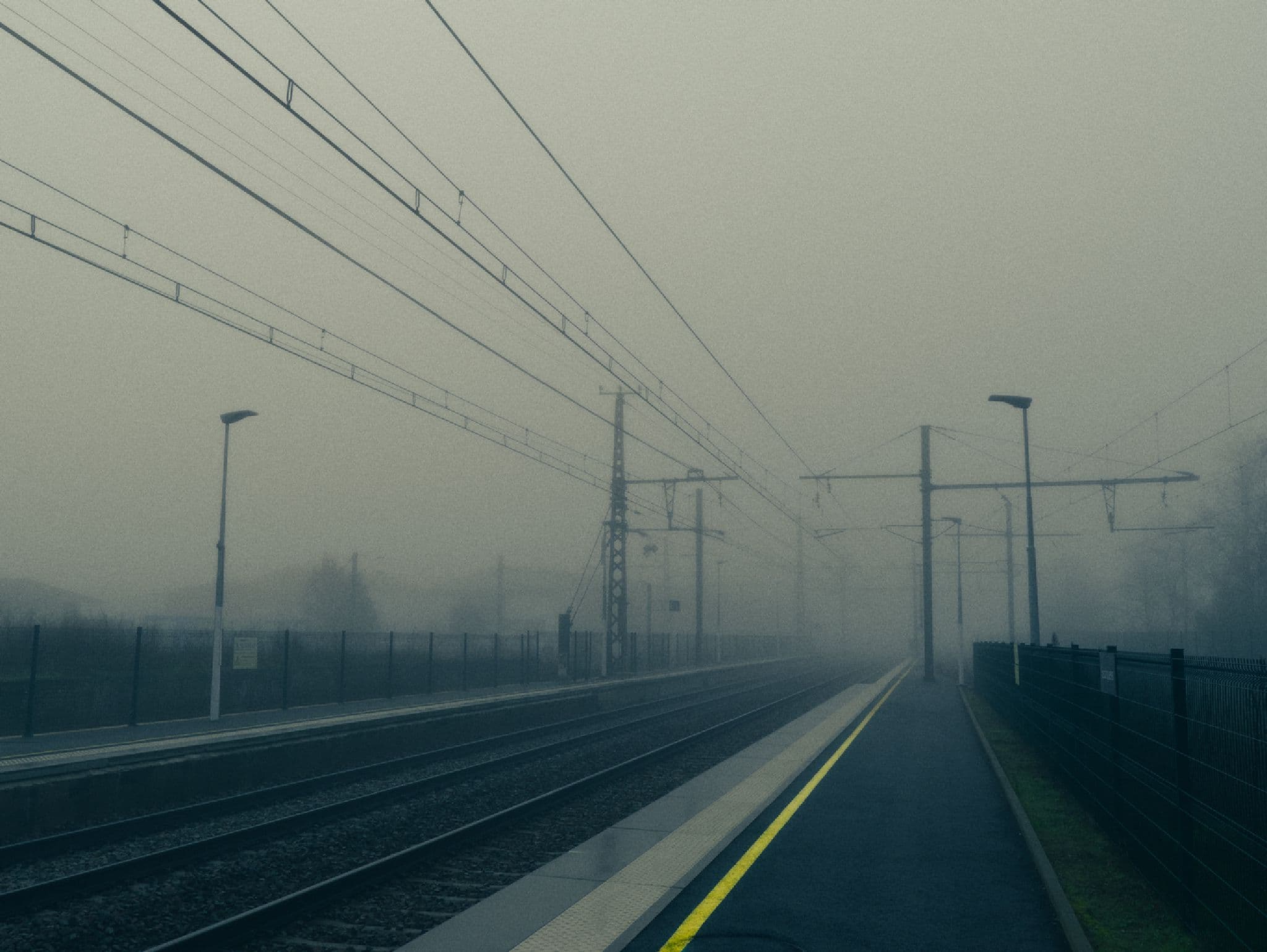 A train station in the fog