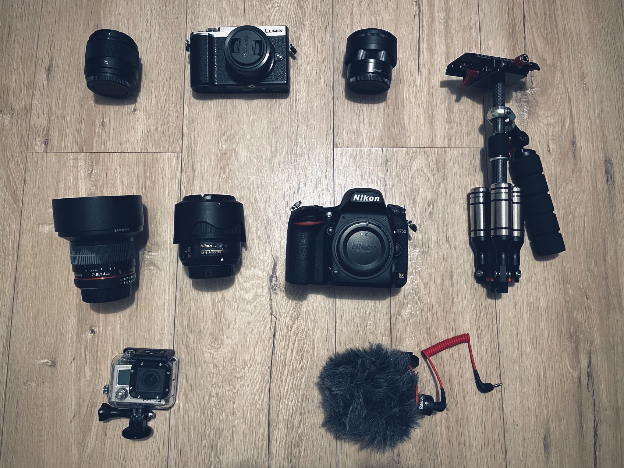 My photography gear including a Lumix GX8 with two zooms and a 